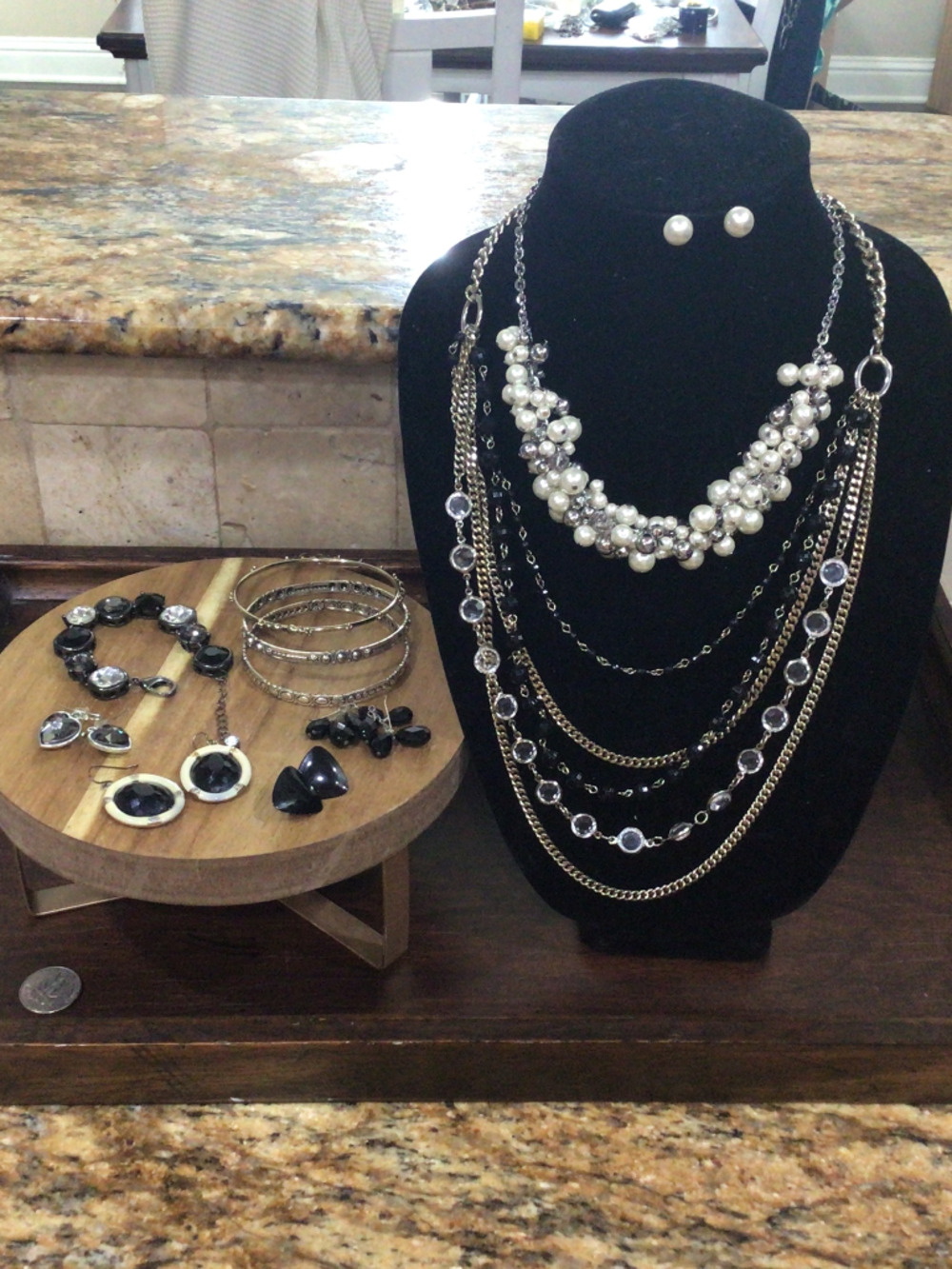 Miscellaneous tray of jewelry contains a Loft and a Coldwater creek necklace.